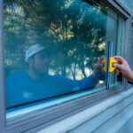 Window restoration process improving clarity and removing damage